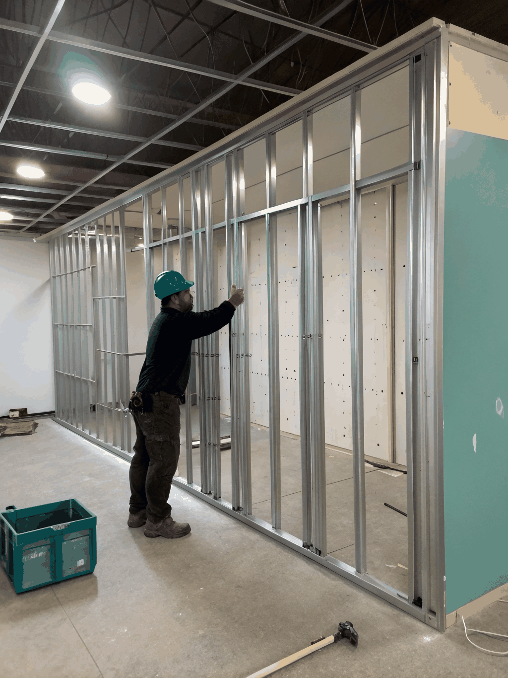 Close up of steel stud and track installation